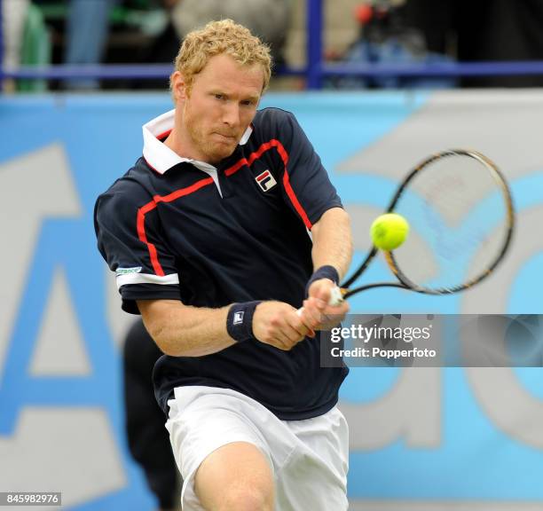 Dmitry Tursunov of Russia in action during the Men's Final against Frank Dancevic of Canada during day six of the AEGON International on June 20,...