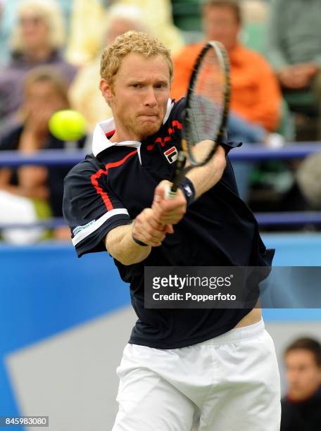 Dmitry Tursunov of Russia in action during the Men's Final against Frank Dancevic of Canada during day six of the AEGON International on June 20,...