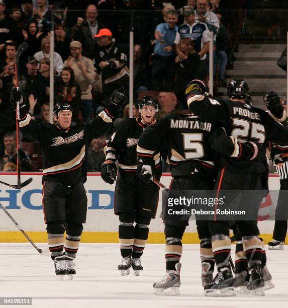 Chris Pronger of the Anaheim Ducks celebrates with his teammates after his 2nd period goal against the Buffalo Sabres during the game on February 02,...