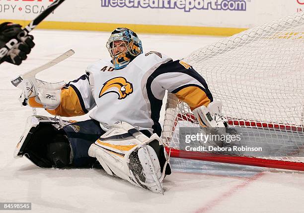 Patrick Lalime of the Buffalo Sabres falls into the net after it was dislodged against the Anaheim Ducks during the game on February 02, 2009 at...