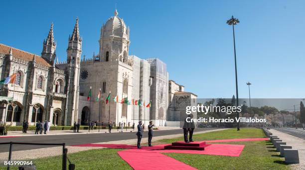 Portuguese President Marcelo Rebelo de Sousa and the President of Ivory Coast Alassane Dramane Ouattara listen to both countries national anthems...