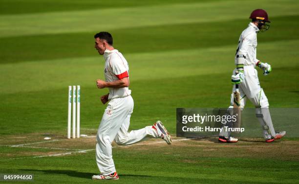 Ryan McLaren of Lancashire celebrates the wicket of Eddie Byrom of Somerset during Day One of the Specsavers County Championship Division One match...