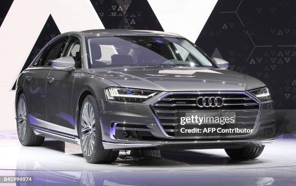 An Audi A8 car is presented at the Frankfurt Motor Show IAA in Frankfurt am Main, western Germany, on September 12, 2017. According to organisers,...