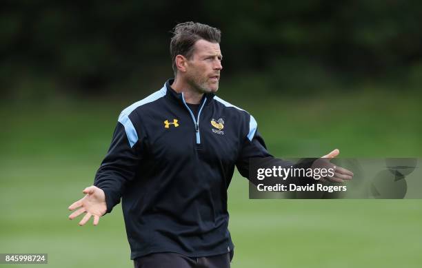 Andy Titterrell, the Wasps forwards coach issues instructions during the Wasps training session held at their training venue on September 12, 2017 in...