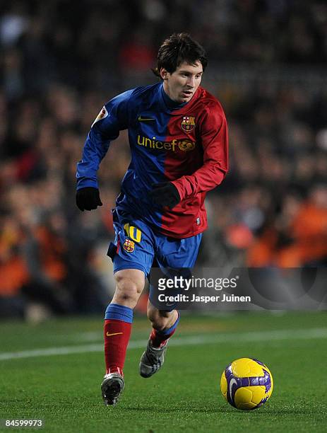 Lionel Messi of Barcelona runs with the ball during the Copa del Rey quarter final second leg match between Barcelona and Espanyol at the Camp Nou...
