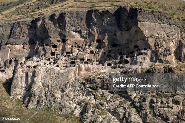 View taken on August 15, 2017 of the cave monastery site of Vardzia in southern Georgia on August 15, 2017. / AFP PHOTO / JOEL SAGET