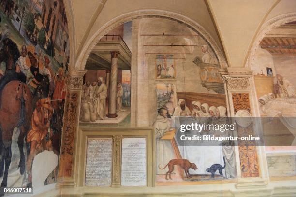 Italy. The Abbey of Monte Oliveto. Abbazia di Monte Oliveto Maggiore. The Cloister with Frescoes by Luca Signorelli And Giovanni Antonio Bazzi....