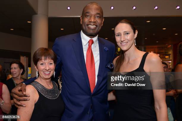 Muffet McGraw, Ruth Riley and Dikembe Mutombo pose for a photo before the 2017 Basketball Hall of Fame Enshrinement Ceremony on September 8, 2017 at...