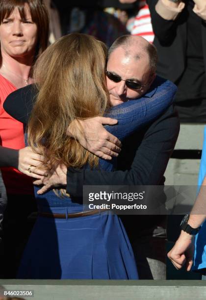 Andy Murray's wife, Kim Sears, and father, William Murray, celebrate after Murray wins his semi final match against Jo-Wilfried Tsonga of France at...