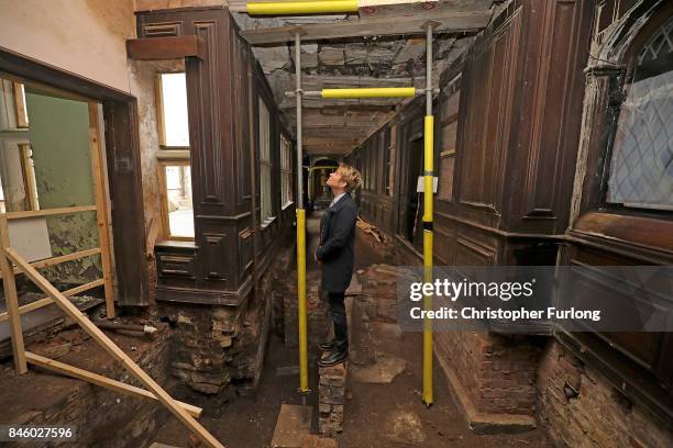 Film actor Hopwood DePree XIV stands inside Hopwood Hall, his family's ancestral home, that he hopes to restore to its former glory on September 12,...