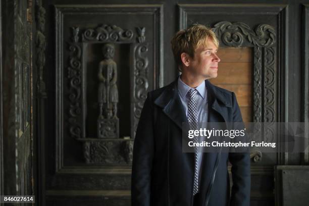 Film actor Hopwood DePree XIV stands inside Hopwood Hall, his family's ancestral home, that he hopes to restore to its former glory on September 12,...