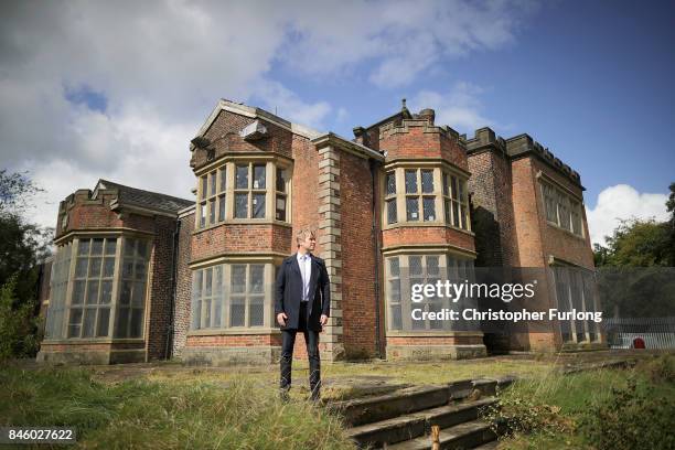 Film actor Hopwood DePree XIV stands outside Hopwood Hall, his family's ancestral home, that he hopes to restore to its former glory on September 12,...