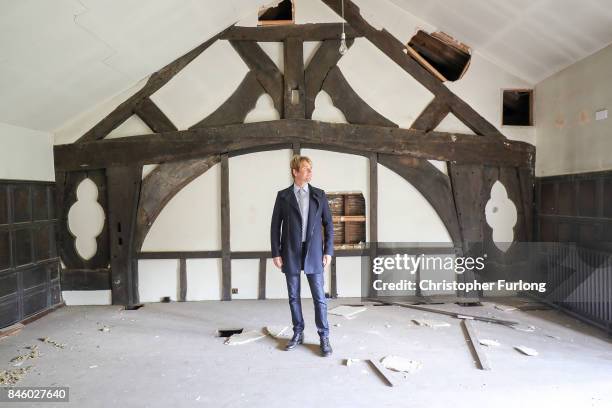 Film actor Hopwood DePree XIV stands inside Hopwood Hall, his family's ancestral home, that he hopes to restore to its former glory on September 12,...