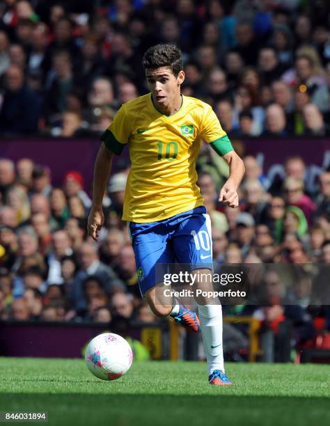 Oscar of Brazil in action during the Men's Football match between Brazil and Belarus on Day 2 of the London 2012 Olympic Games at Old Trafford on...