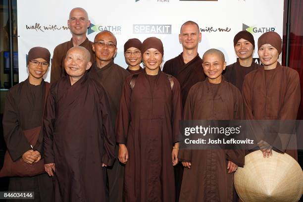 The Thich Nhat Hanh's global monastic community attend the 'Walk With Me' premiere at Laemmle's Ahrya Fine Arts Theatre on September 9, 2017 in...