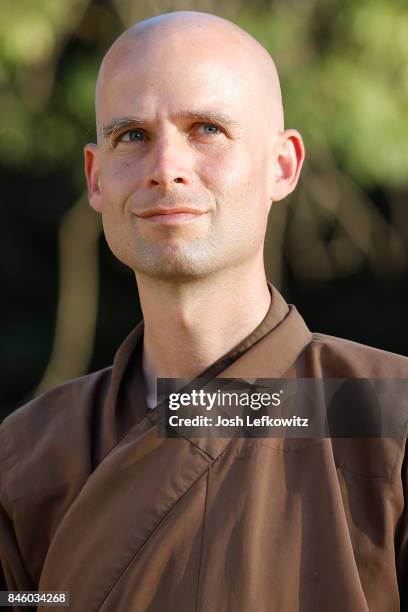 Brother Phap Luu leads a silent peace walk alongside 50 others of the Thich Nhat Hanh's global monastic community at La Cienega Park before the 'Walk...