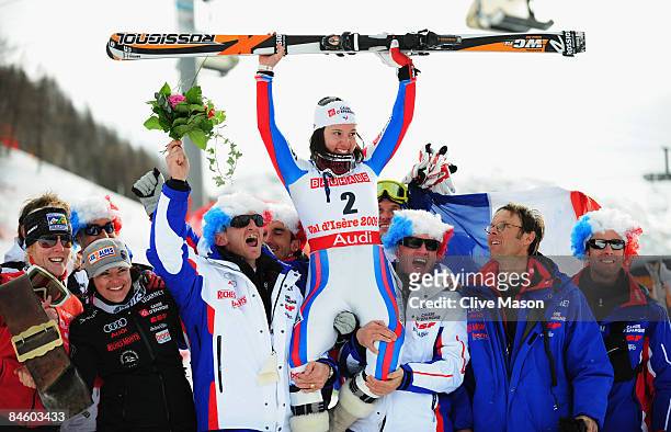 Marie Marchand-Arvier of France celebrates with team mates as she finishes second while competing during the Women's Super G event held on the Face...
