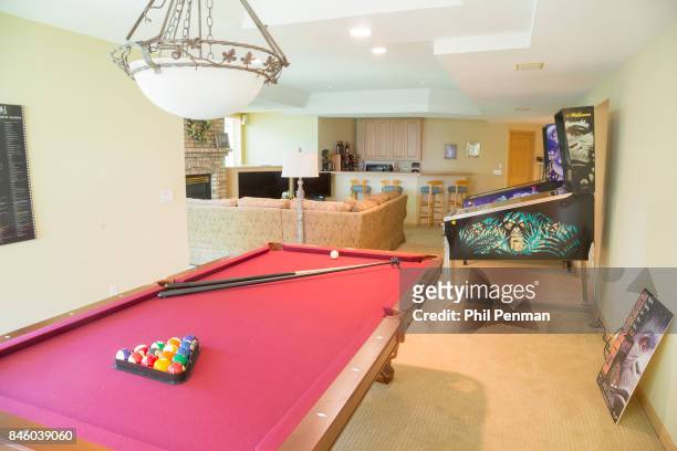 Actor Ernie Hudson's home is photographed for Closer Weekly Magazine on July 5, 2017 in Minnesota. Game room. PUBLISHED IMAGE.