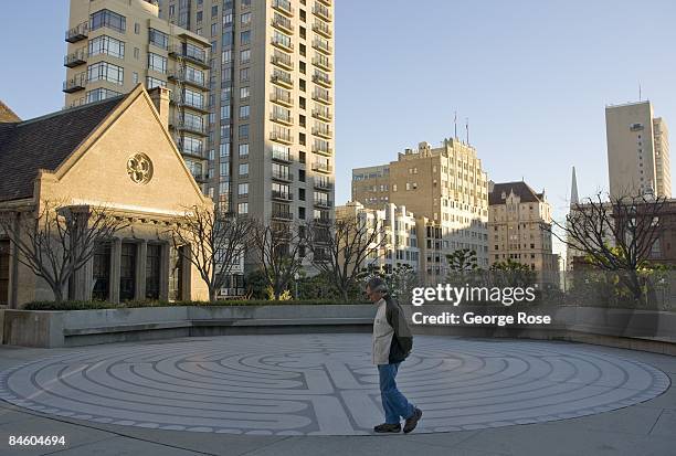 Man walks through the courtyard at Grace Cathedral on Nob Hill in this 2009 San Francisco, California, early morning city landscape photo.