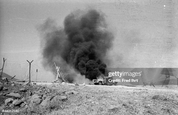 Bombed civilian car on the Golan Heights during the Yom Kippur war. It was driven by journalists Fred Ihrt and Nicholas Tomalin. Nicholas Tomalin...