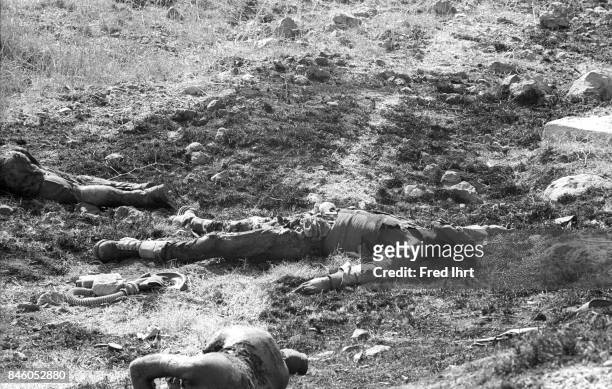 Dead soldiers lying on the ground on the Golan Heights during the Yom Kippur war.
