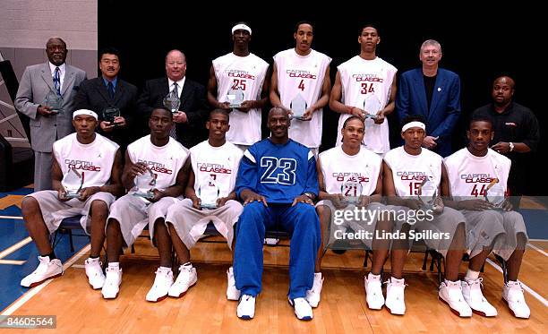 The Jordan Classic Silver Team, front, left to right, Dion Harris, Taurean Minor, Chris Paul, Michael Jordan, Shannon Brown, J.R. Giddens, Ndudi Ebi....