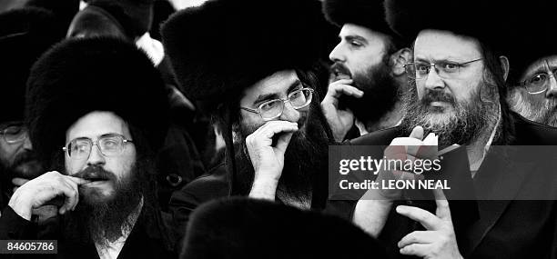 Ultra-Orthodox Jewish men queue to see a rabbi during a religious Hasidic wedding celebration in the heart of Jerusalem on February 3, 2009. The...