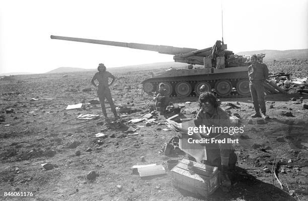 Israeli soldiers hanging out around their tank during the Yom Kippur war.
