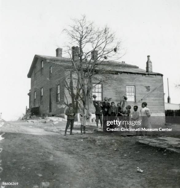 In Walnut Hills is pictured the home of the American Quaker and abolitionist Levi Coffin . Located in Cincinnati, it functioned as a stop on the...