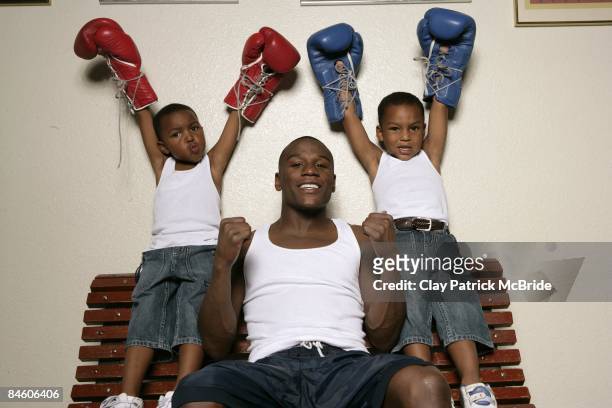 Light Welterweight Boxing: Casual portrait of Floyd Mayweather Jr. With sons 4-year-old Shamaree and 6-year-old Koraun at home. Las Vegas, NV...