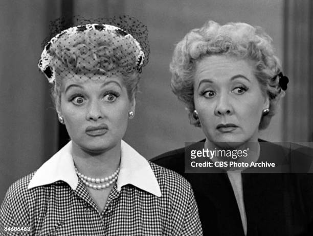 American comic actresses Lucille Ball , as Lucy Ricardo, and Vivian Vance , as Ethel Mertz, stand side by side in a scene from an episode of the...