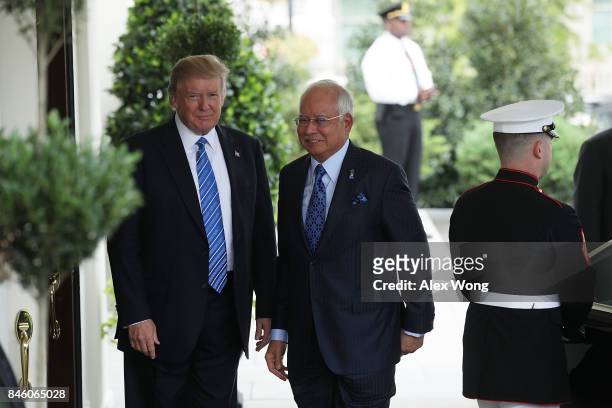 President Donald Trump welcomes Prime Minister Najib Abdul Razak of Malaysia outside the West Wing of the White House September 12, 2017 in...