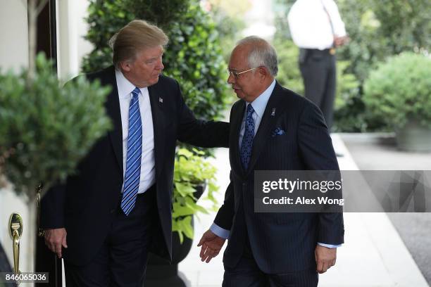 President Donald Trump welcomes Prime Minister Najib Abdul Razak of Malaysia outside the West Wing of the White House September 12, 2017 in...