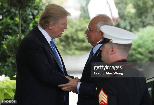 President Donald Trump welcomes Prime Minister Najib Abdul Razak of Malaysia outside the West Wing of the White House September 12, 2017 in...