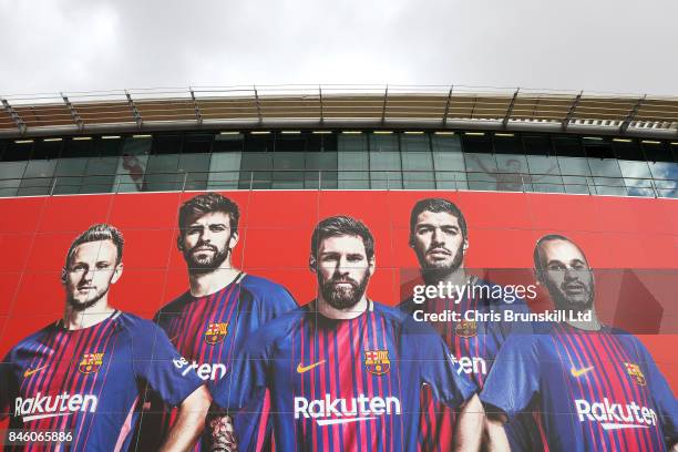 Barcelona players are seen on a giant billboard outside the stadium ahead of the UEFA Champions League Group D match between FC Barcelona and...