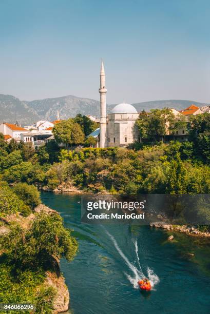 mosque over the neretva river, mostar - sarajevo stock pictures, royalty-free photos & images