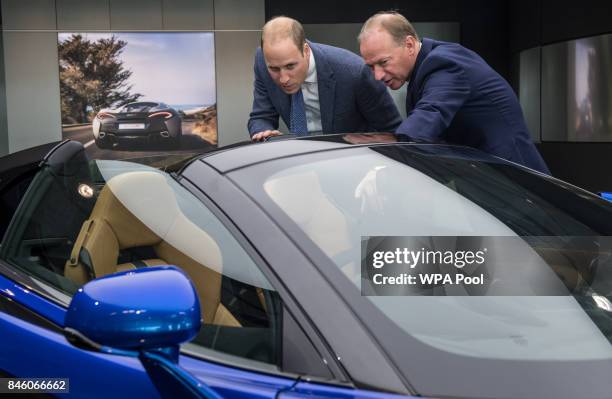 Prince William, Duke of Cambridge is shown a McLaren 720S, by Mike Flewitt, CEO of McLaren Automative during a visit to McLaren Automotive at McLaren...