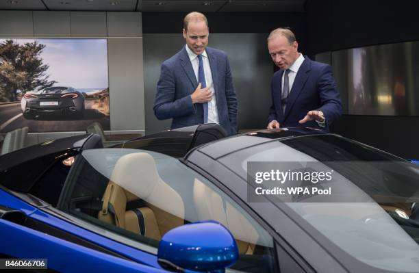 Prince William, Duke of Cambridge is shown a McLaren 720S, by Mike Flewitt, CEO of McLaren Automative during a visit to McLaren Automotive at McLaren...