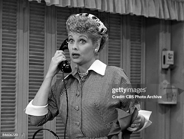 American actress and comedienne Lucille Ball , as Lucy Ricardo, talks on the telephone in a scene from an episode of the television comedy 'I Love...