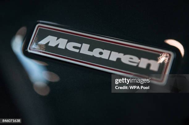 McLaren badge on the bonnet of a car in a show room during Prince William, Duke of Cambridge's visit to McLaren Automotive at McLaren Technology...