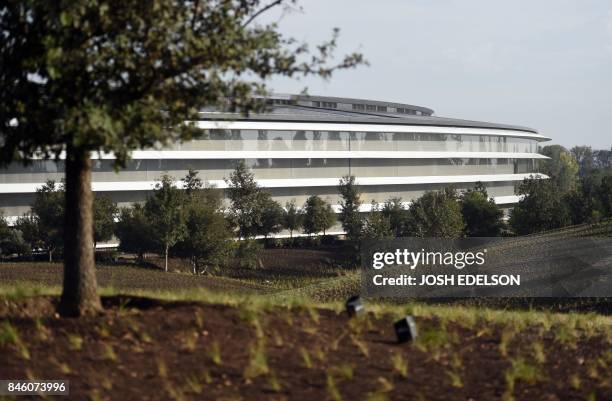 Apple's new headquarters building is seen ahead of a media event where Apple is expected to announce a new iPhone and other products in Cupertino,...