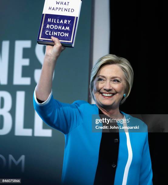 Former US Secretary of State, Hillary Clinton signs copies of her book, "What Happened" at Barnes & Noble Union Square on September 12, 2017 in New...