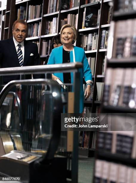 Former US Secretary of State, Hillary Clinton signs copies of her book, "What Happened" at Barnes & Noble Union Square on September 12, 2017 in New...