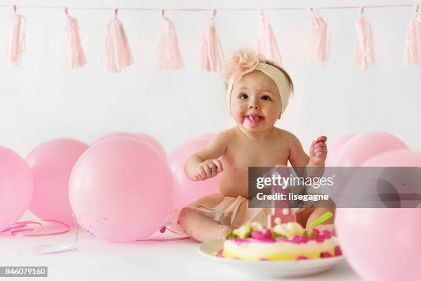 smash the cake party - cake smashing stock pictures, royalty-free photos & images