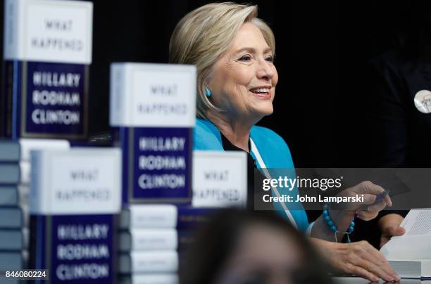 Former US Secretary of State, Hillary Clinton signs copies of her book, "What Happened" at Barnes & Noble Union Square on September 12, 2017 in New...