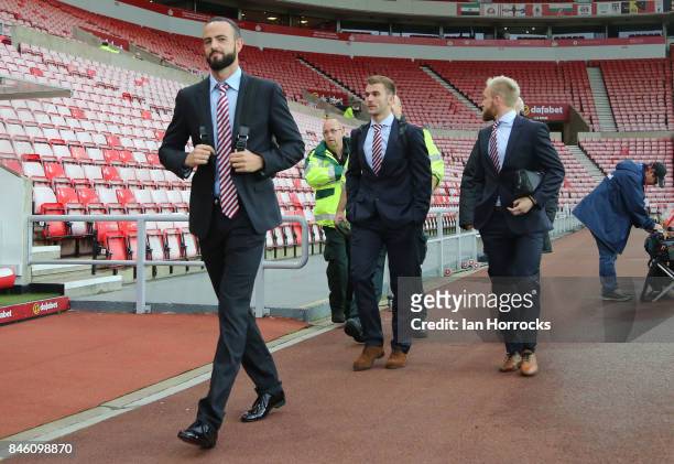 Sunderland players Marc Wilson , Callum McManaman and Jonny Williams walk in to the ground before the Sky Bet Championship match between Sunderland...