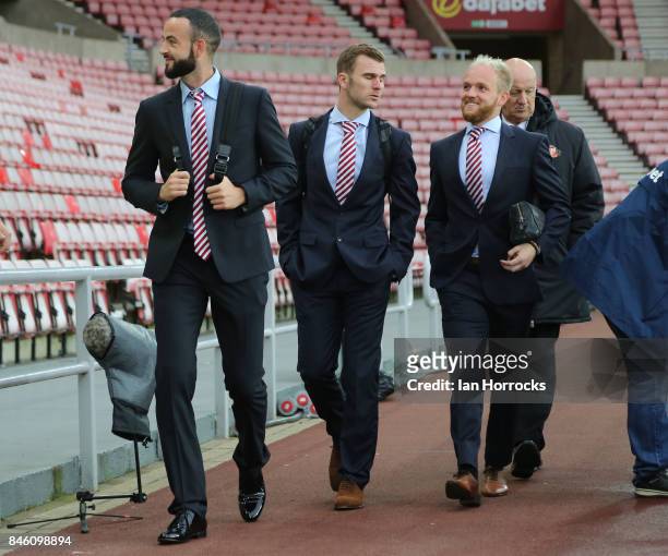 Sunderland players Marc Wilson , Callum McManaman and Jonny Williams walk in to the ground before the Sky Bet Championship match between Sunderland...