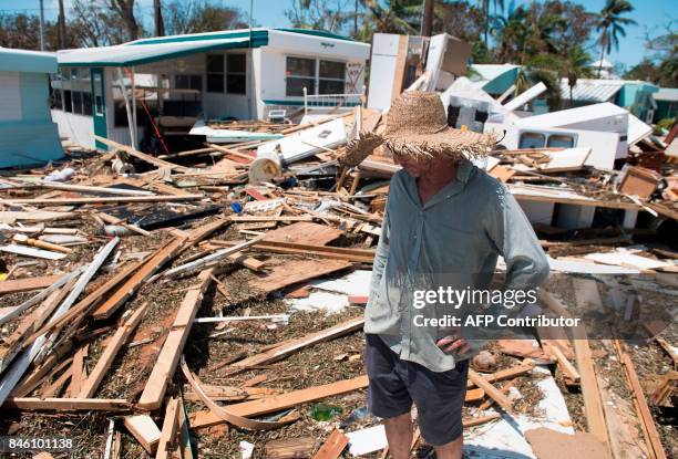 Bill Quinn surveys the damage caused to his trailer home from Hurricane Irma at the Seabreeze Trailer Park in Islamorada, in the Florida Keys,...