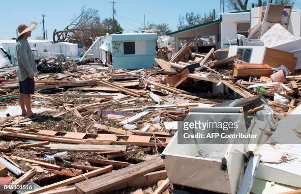 Bill Quinn surveys the damage caused to his trailer home from Hurricane Irma at the Seabreeze Trailer Park in Islamorada, in the Florida Keys,...