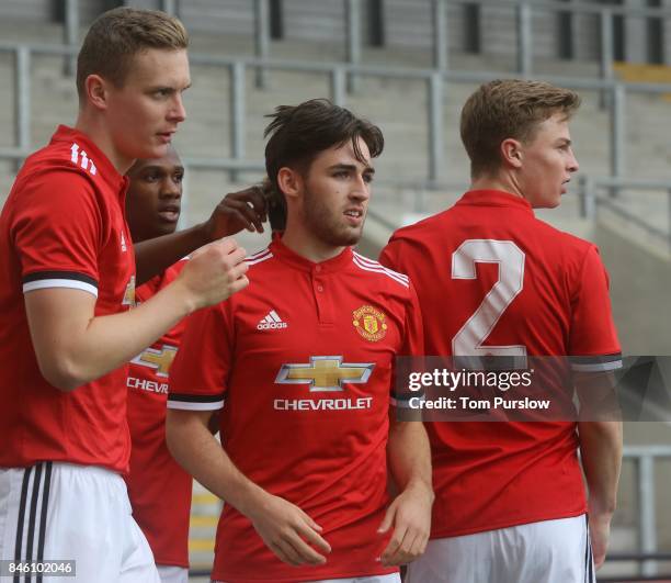 Aidan Barlow of Manchester United U19s celebrates scoring their first goal during the UEFA Youth League match between Manchester United U19s and FC...